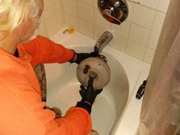 How to Use a Plumbing Snake (Drain Snake) to Unclog Drains